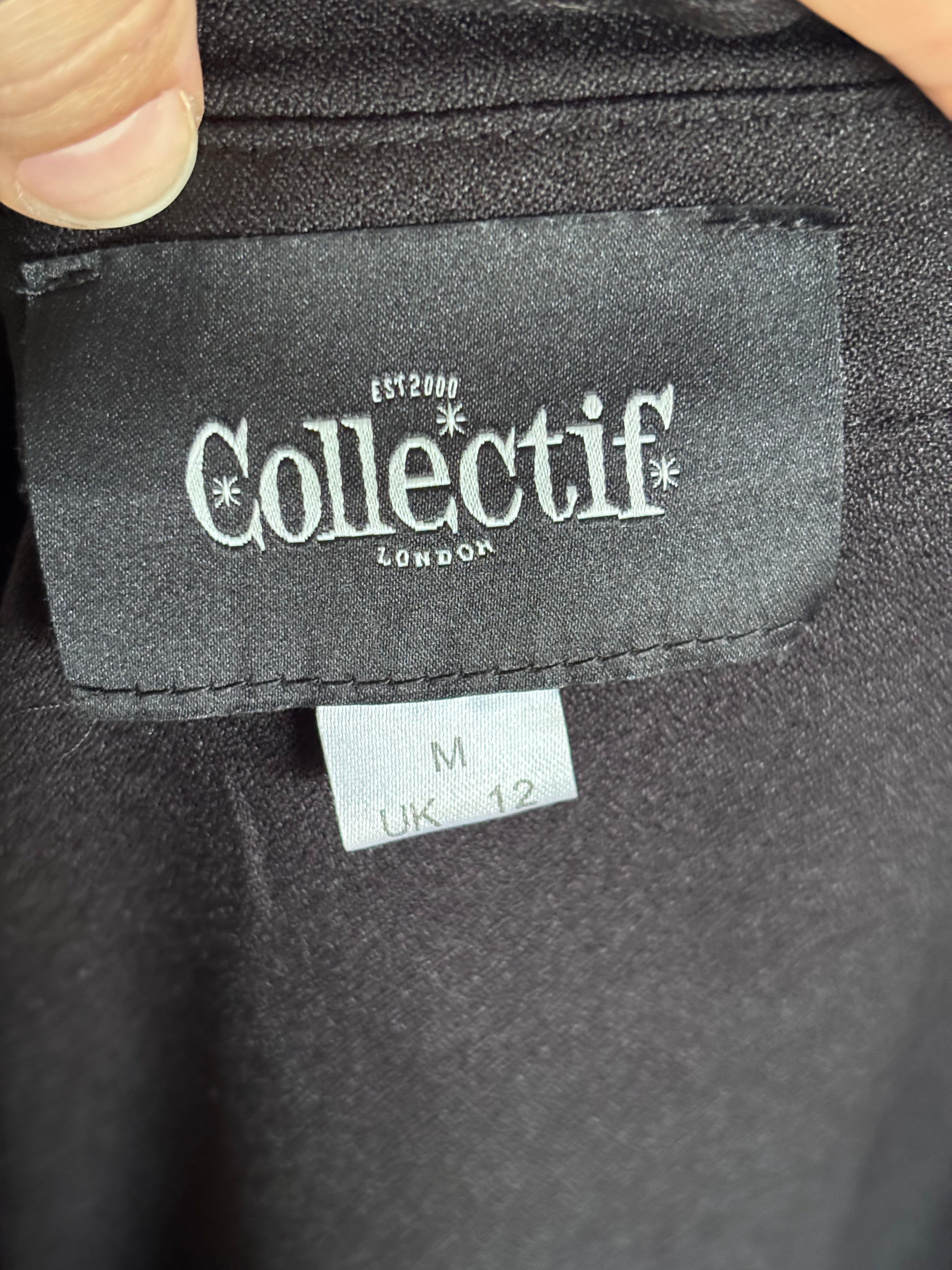 Nocturne Peplum Blouse