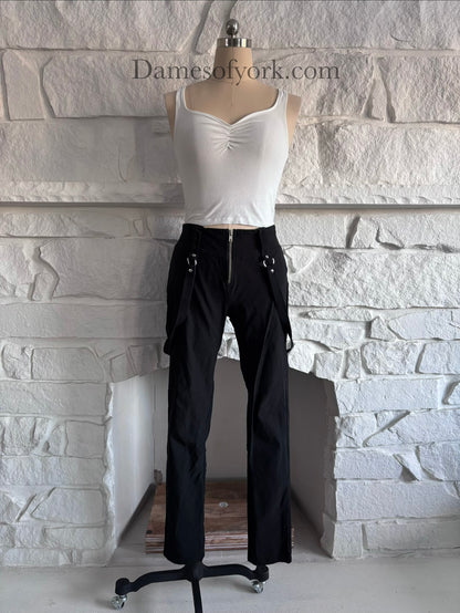 Front view of the Strapline Suspender Pants, black stretch pants with suspenders and a front silver zipper.