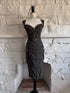 Front view of grey pinstripe fitted dress on mannequin with sweetheart neckline and front zipper