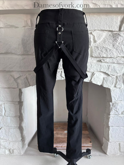 Close-up detail of the back of the Strapline Suspender Pants featuring the silver zipper and suspender straps.