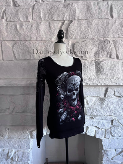 Angled view of the Graveyard Radio Top showing the skull and microphone design and lace panel sleeves.