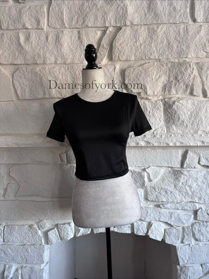 Front view of black industrial goth cropped athletic top on mannequin with breathable mesh panels