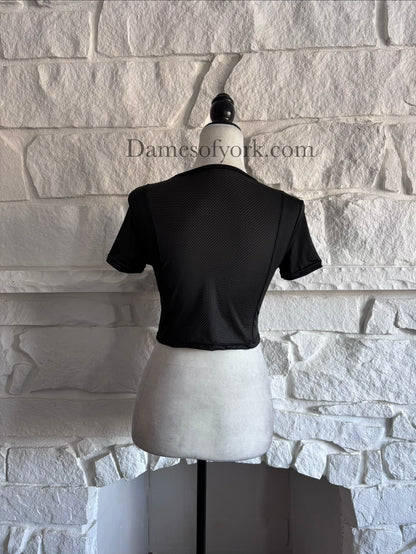 Back view of industrial style black cropped sport top on mannequin
