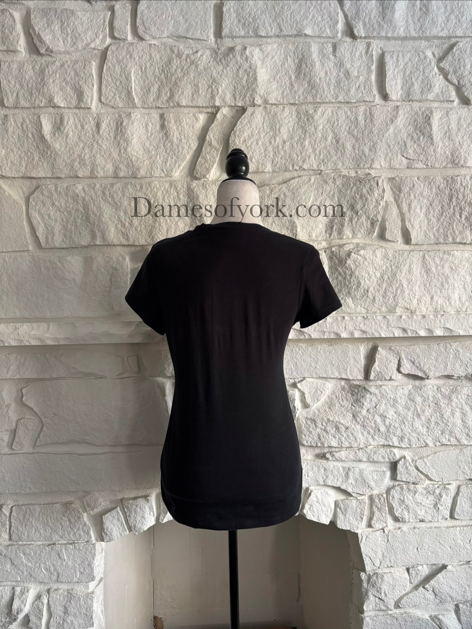 Back view of the t-shirt, the back is all black.