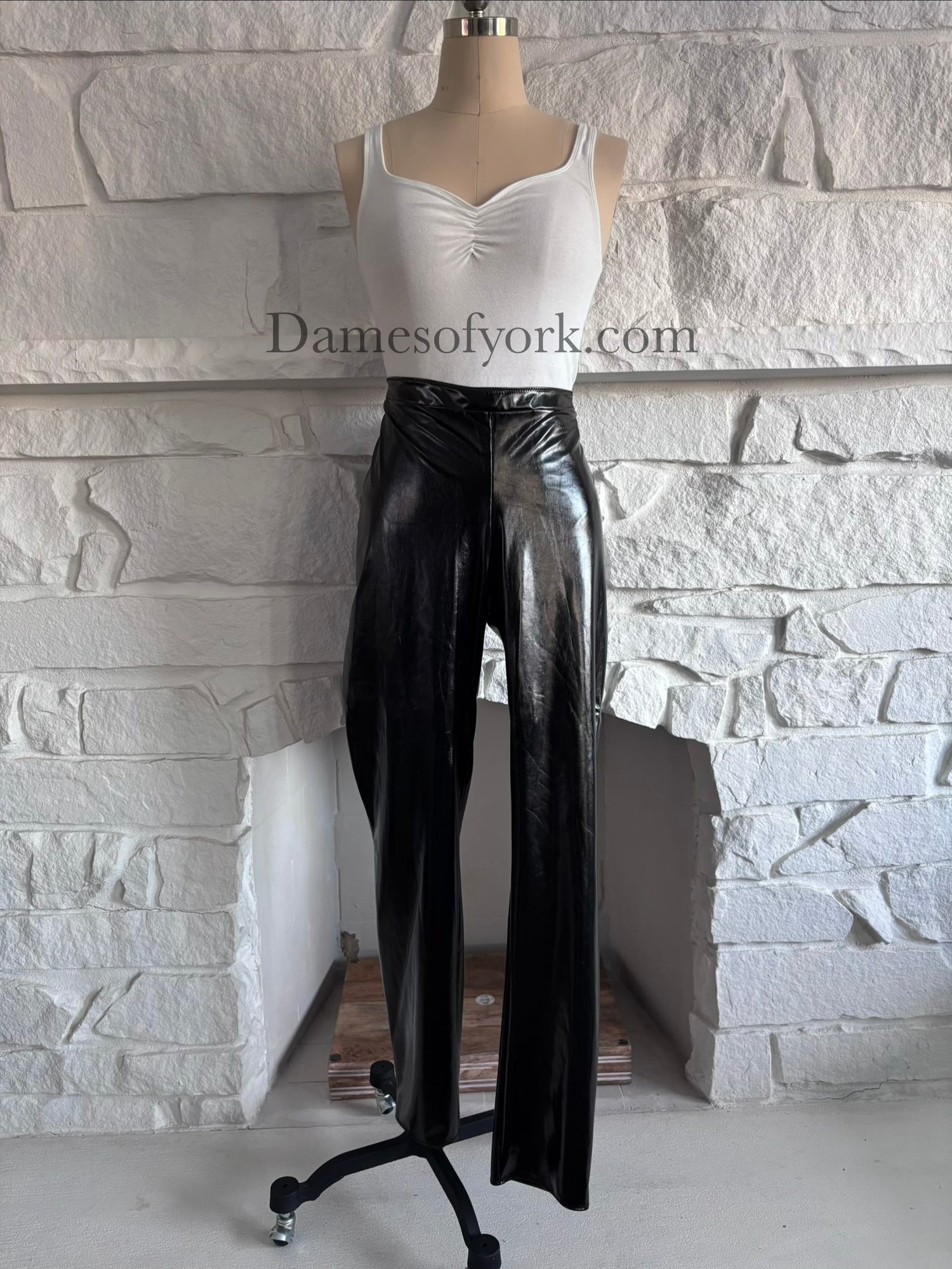 Front view of the Glossy PVC Leggings, shiny black PVC leggings with a sleek fitted silhouette.