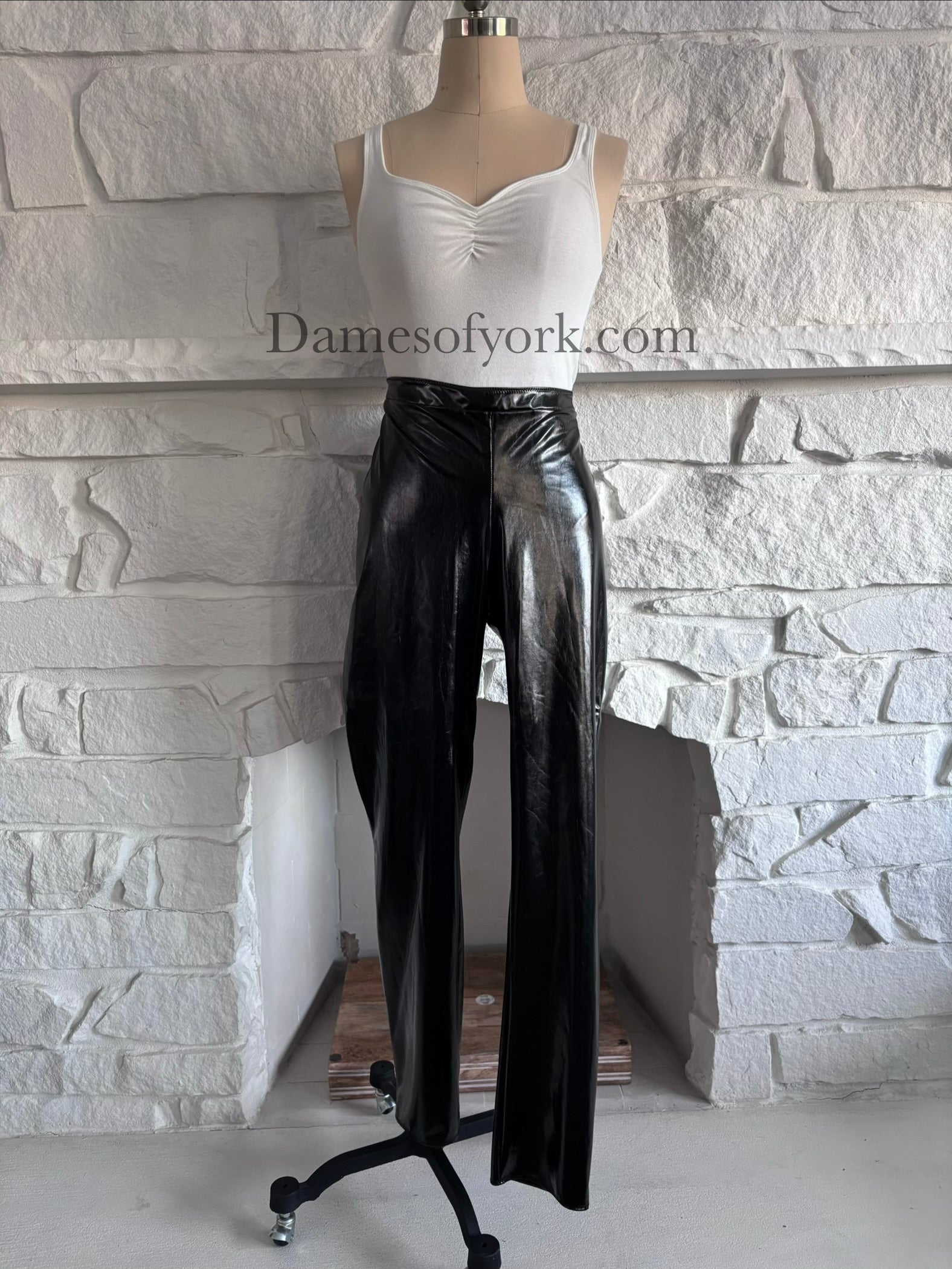 Front view of the Glossy PVC Leggings, shiny black PVC leggings with a sleek fitted silhouette.