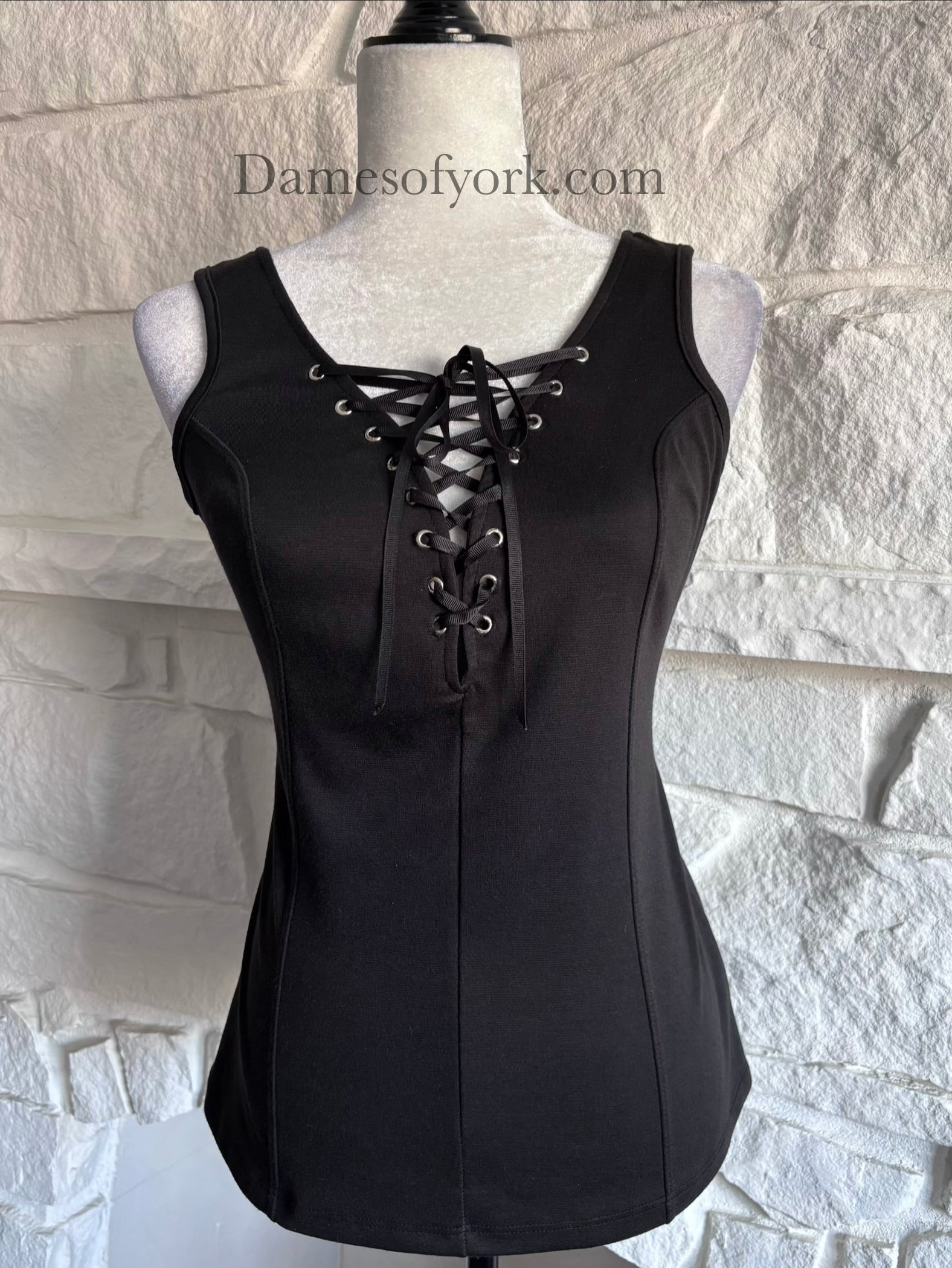 Close-up detail of the Knightfall Lace Up Tank featuring the lace-up front detail.