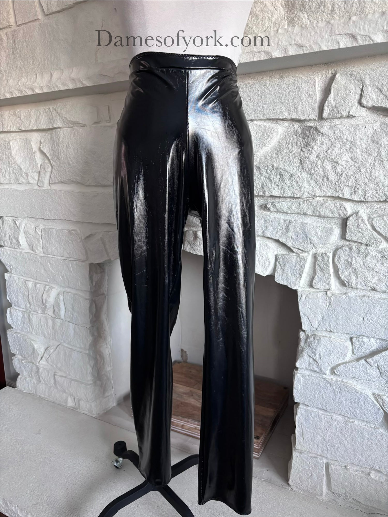 Close-up detail of the Glossy PVC Leggings featuring the shiny black PVC material.