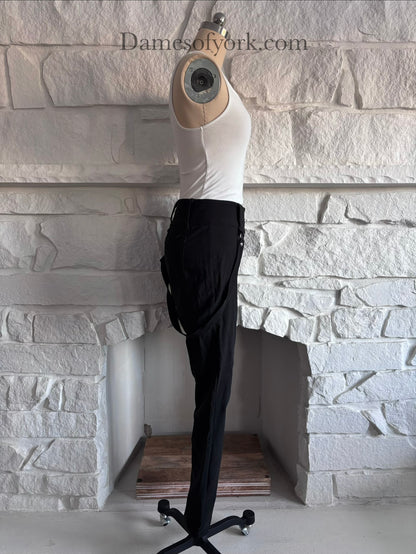 Side view of the Strapline Suspender Pants highlighting the stretch fabric and suspender design.