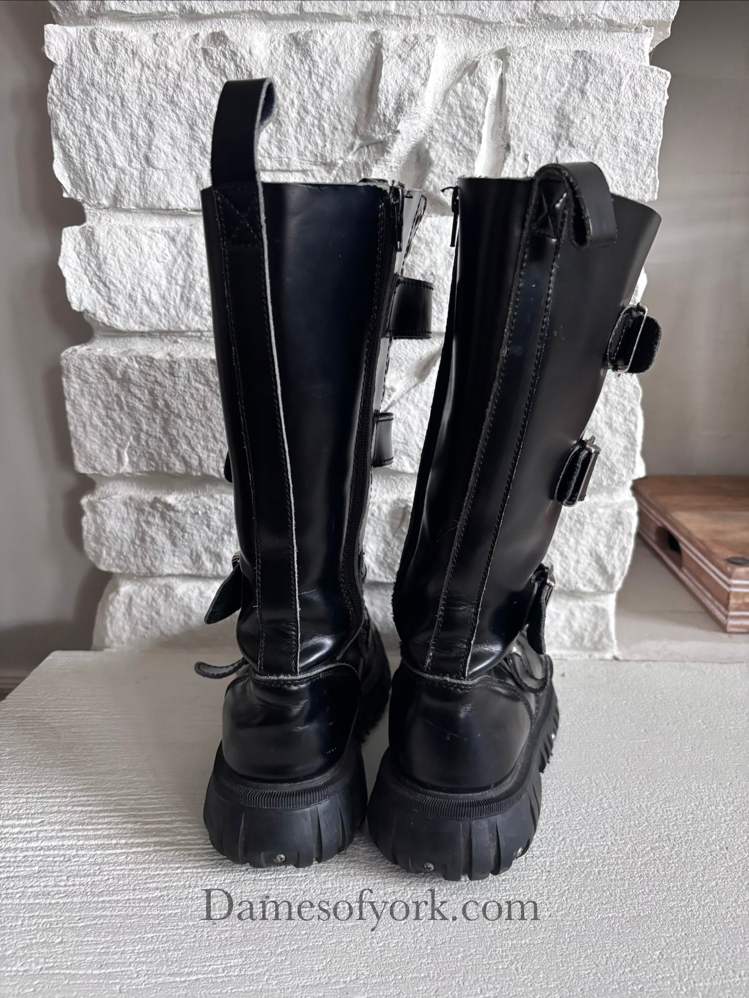 Back view of the Rivet Command Boots showing the structured fit and industrial silhouette.