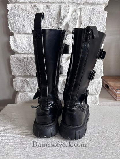 Back view of the Rivet Command Boots showing the structured fit and industrial silhouette.