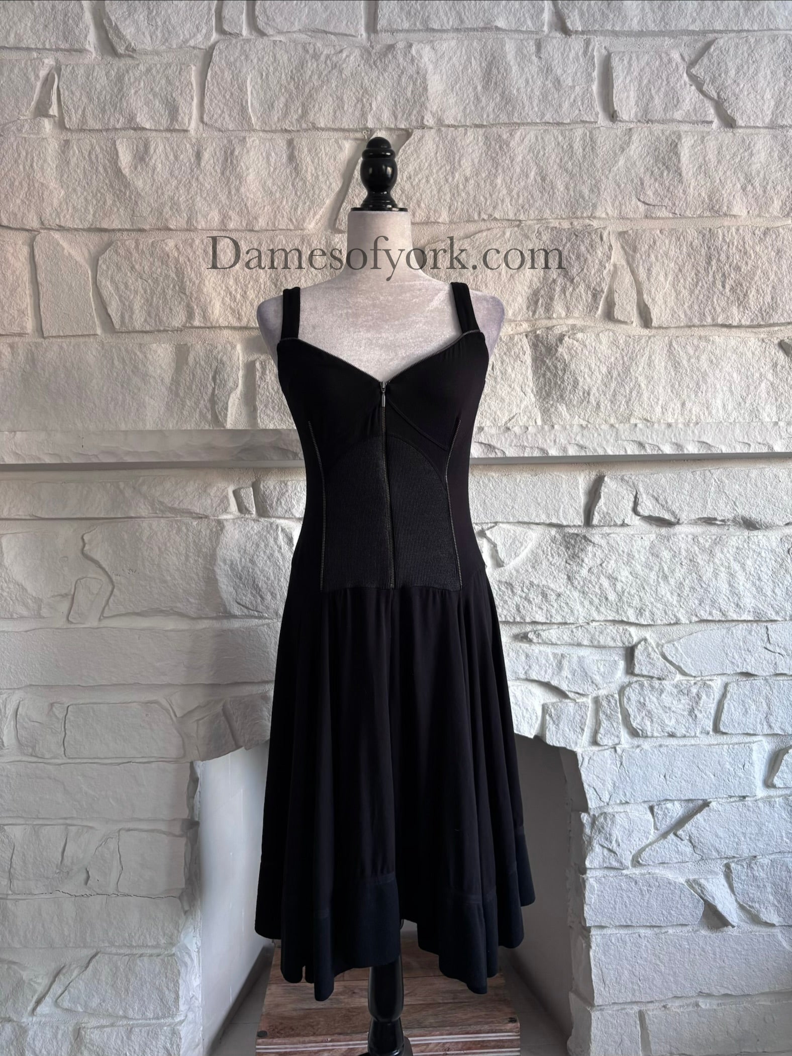 Front view of the Ironheart Zipper Dress, a black sleeveless dress with a sweetheart neckline and decorative zipper details across the bodice.