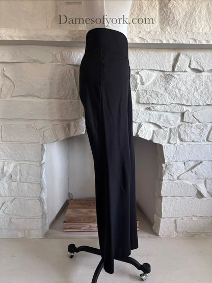 Side view of black flowy trousers on mannequin with high waist and loose leg