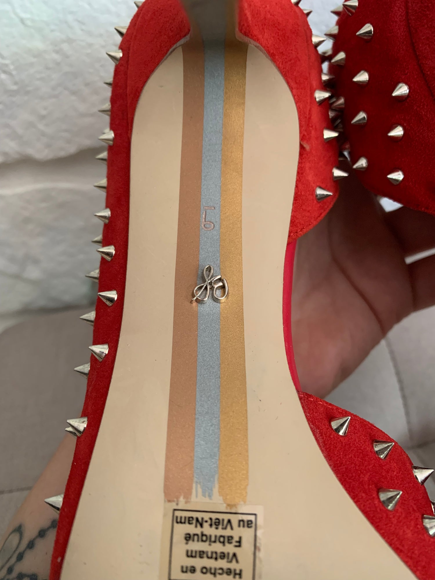 Red Spiked Heels